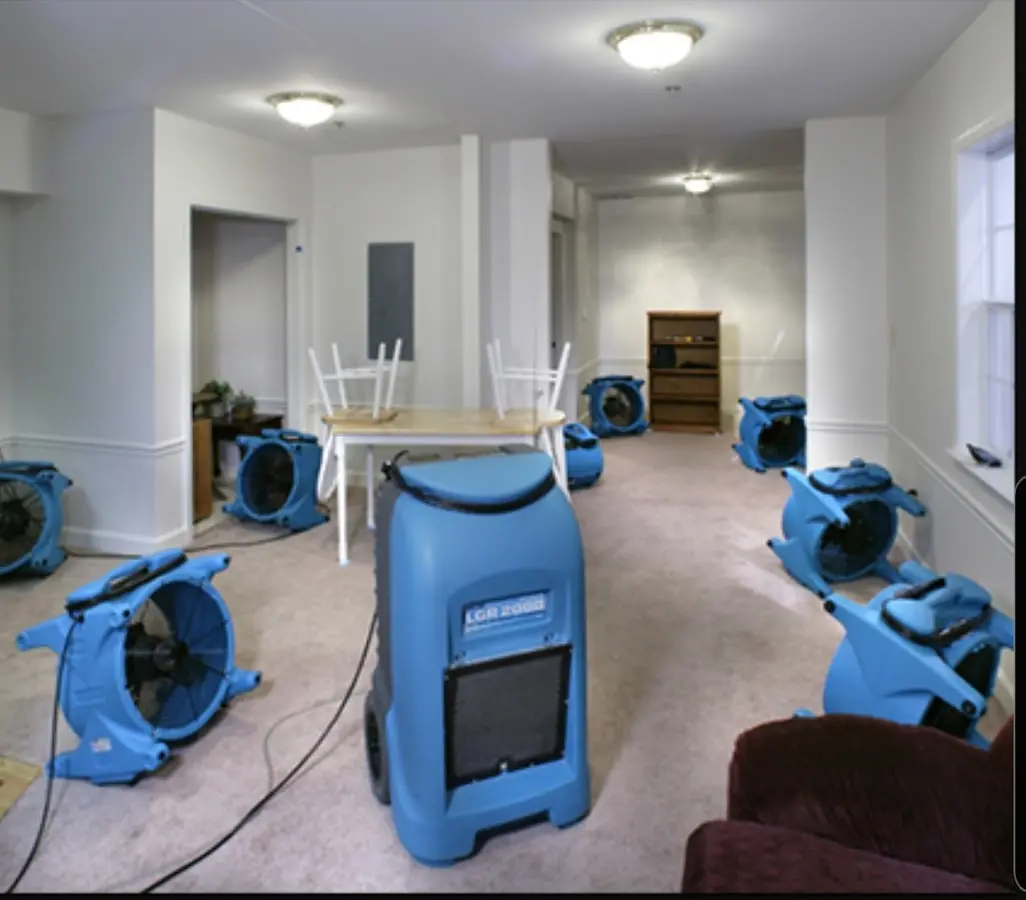 Air movers and dehumidifier setup for Water Damage Restoration in Juneau